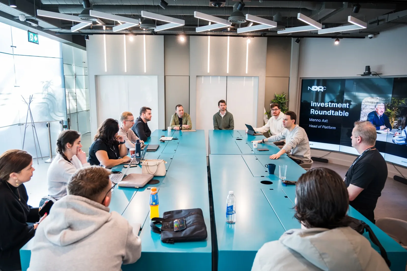 Group seated around a table during an NDRC fundraising class
