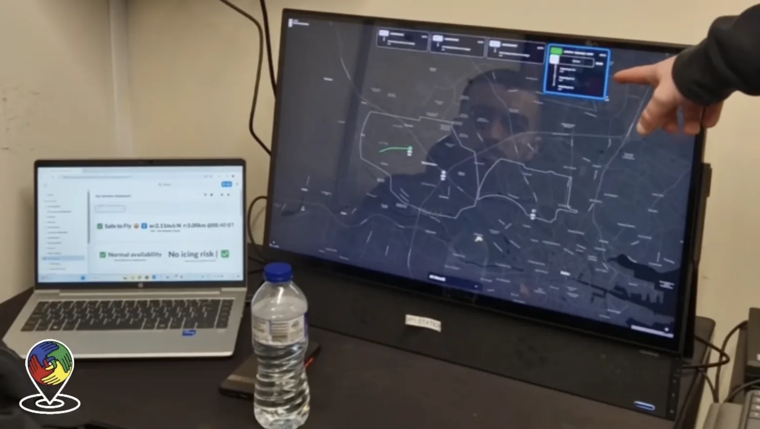 Monitor showing live navigation software for a drone delivering food to a customer