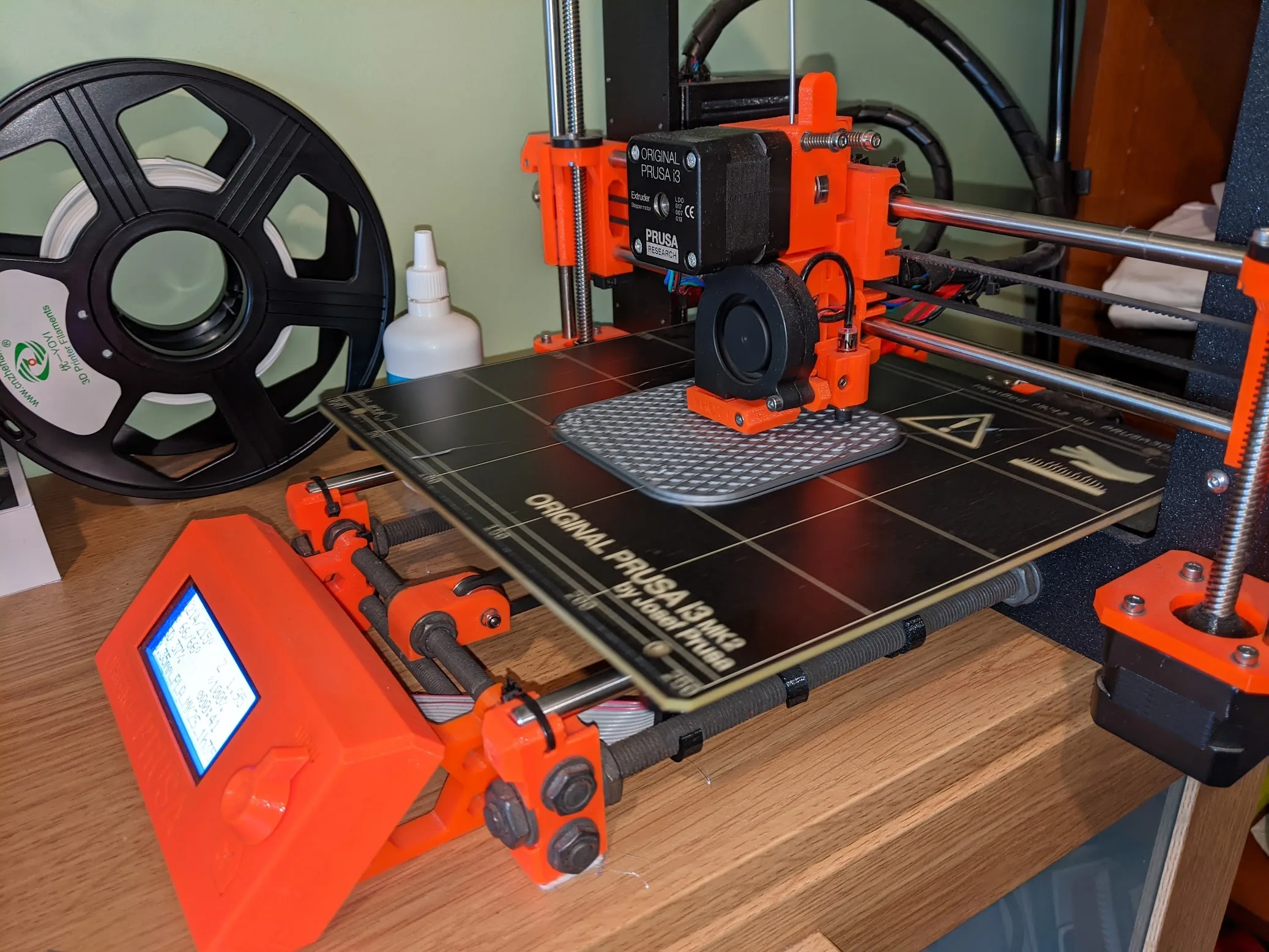 Prusa 3D printer making a grey part for the prototype